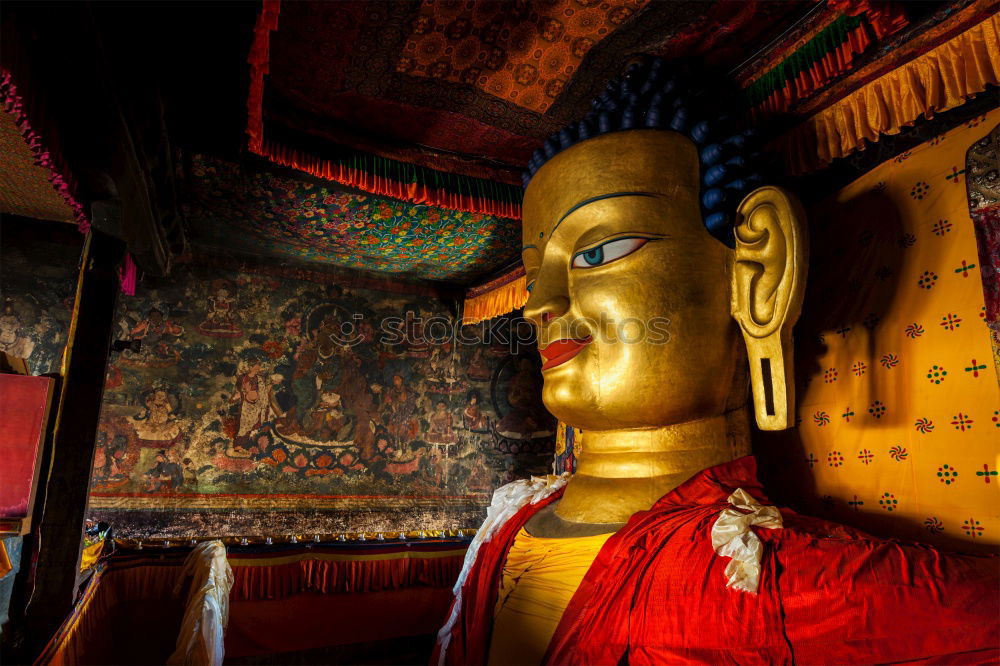 Similar – Image, Stock Photo Buddhist statues in a temple in Vietnam