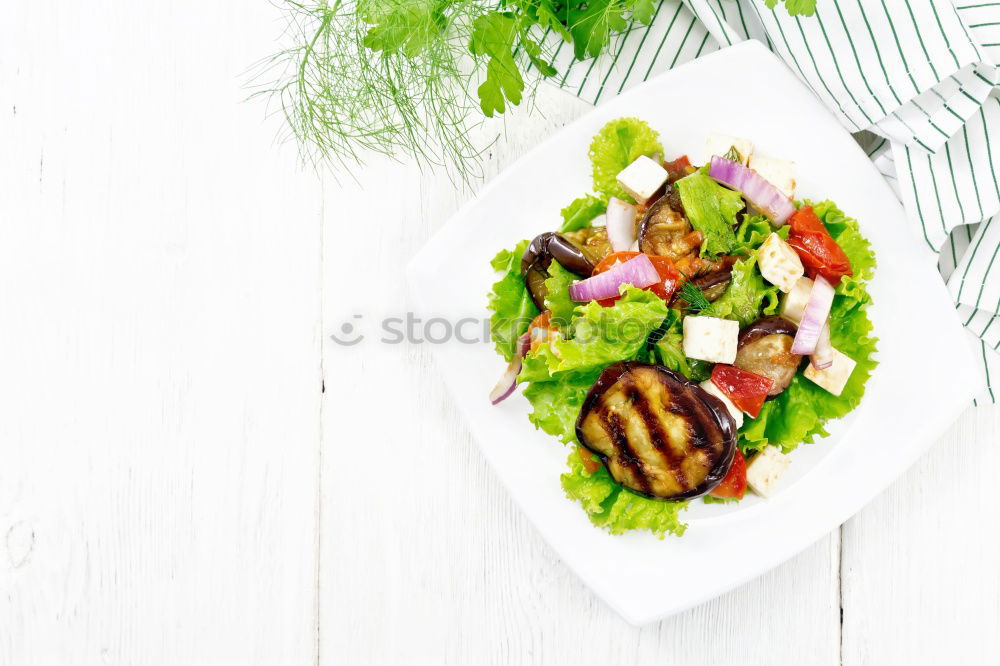 Similar – Mixed salad with baby leaves, radish, cucumber and feta cheese