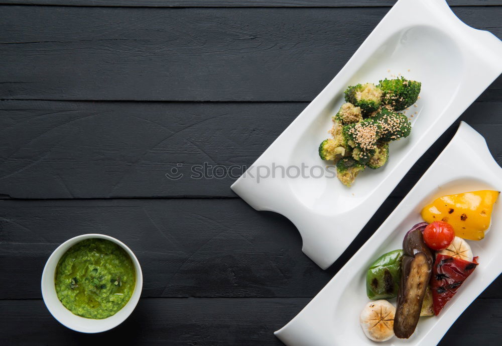 Similar – Pickled herrings with slices of bread and onion sauce