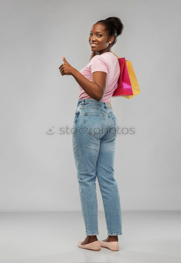 Similar – Young African tourist woman with black curly hairstyle