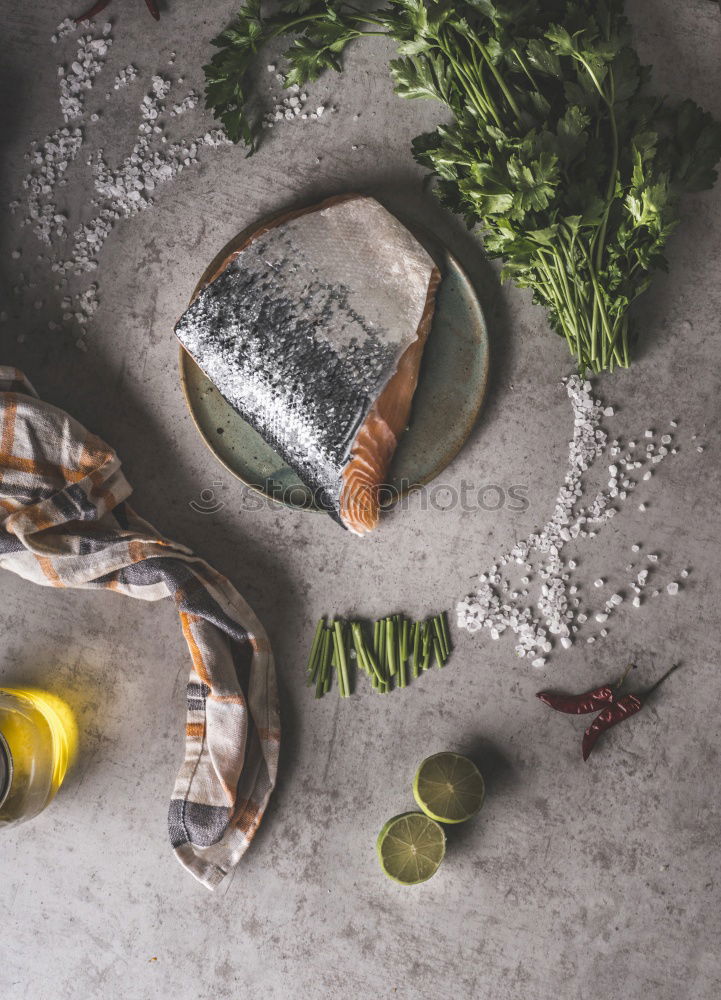 Similar – Image, Stock Photo Raw salmon fish in ice and vegetables