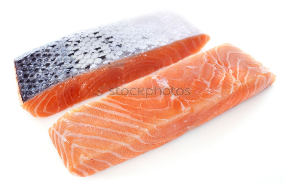 Similar – Fresh raw salmon on a wooden cutting board