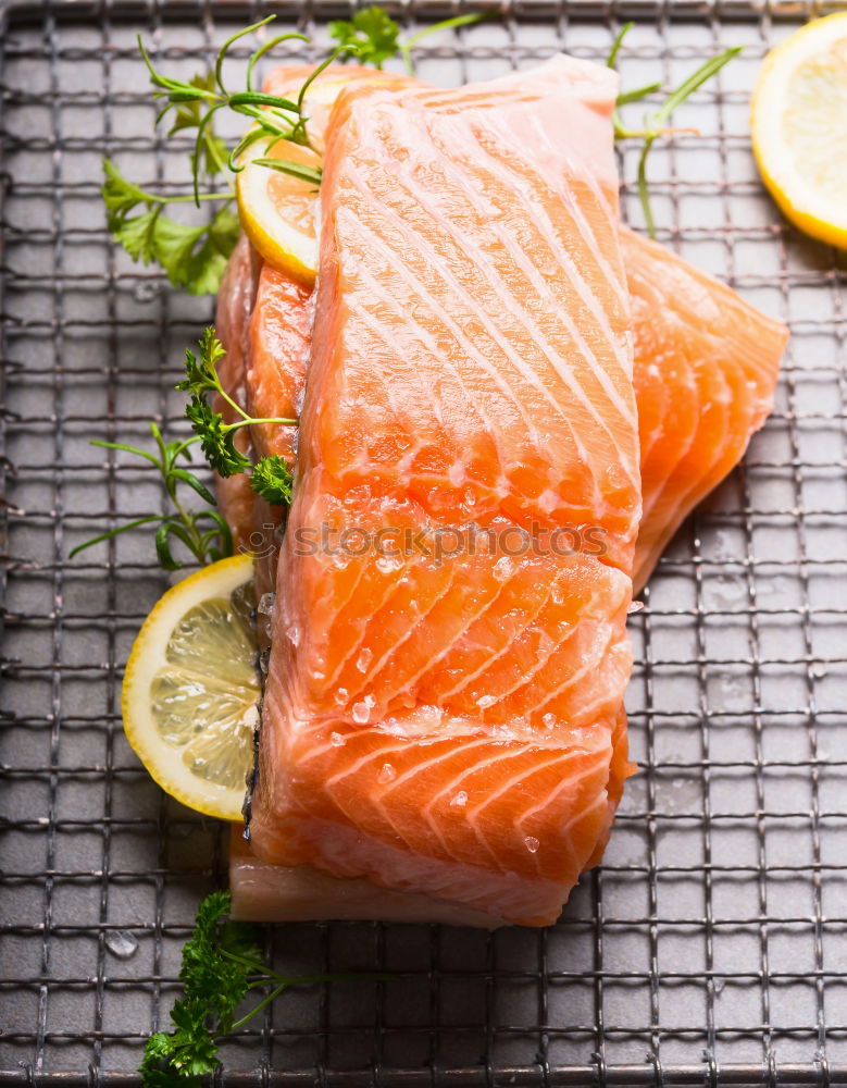 Similar – Salmon fish fillet with lemon in bowl