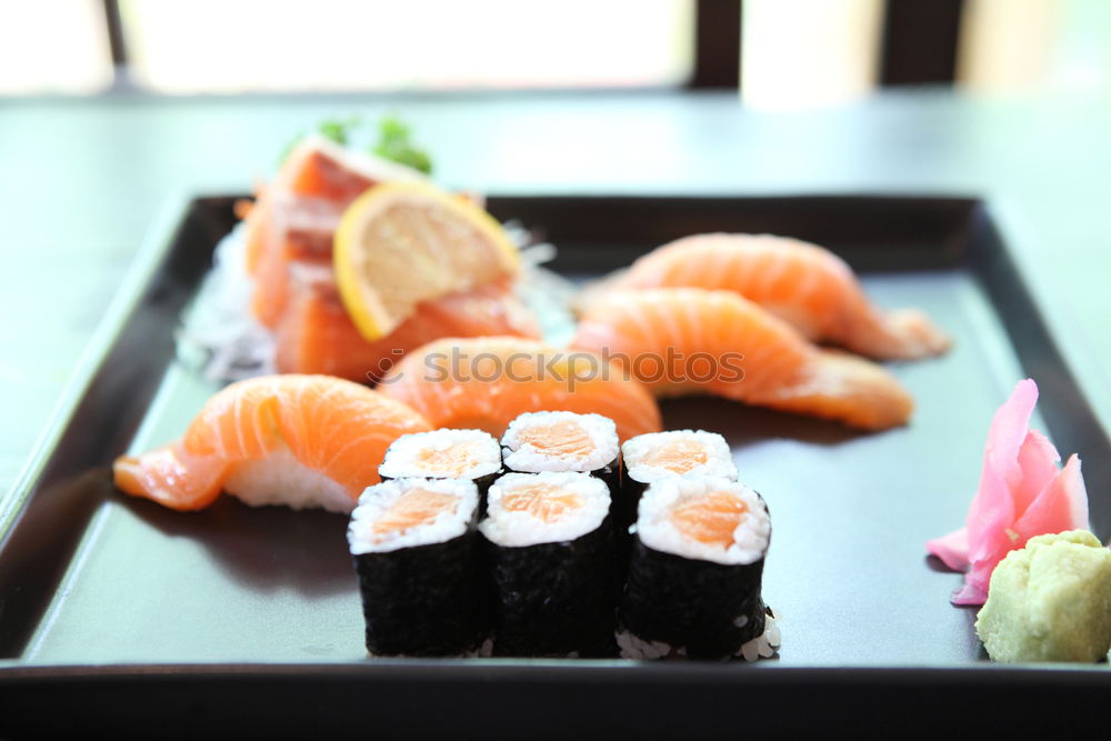 Similar – Crop woman eating sushi