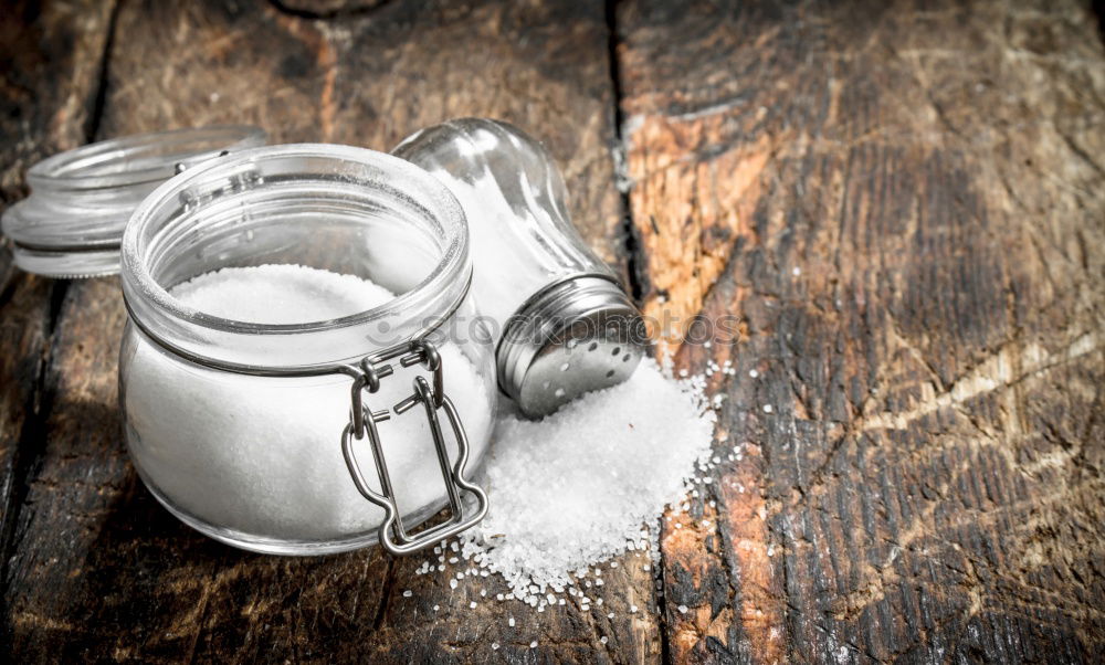 Similar – Image, Stock Photo Salt shaker on pile of salt