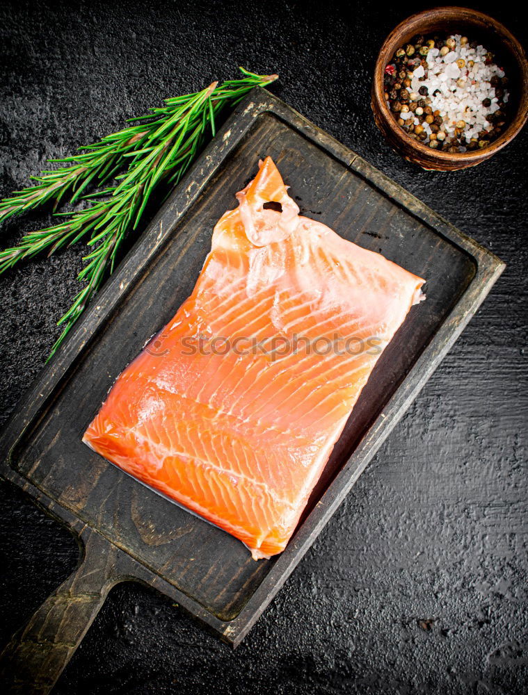 Similar – Image, Stock Photo Salmon fish fillet with lemon on white chopping board