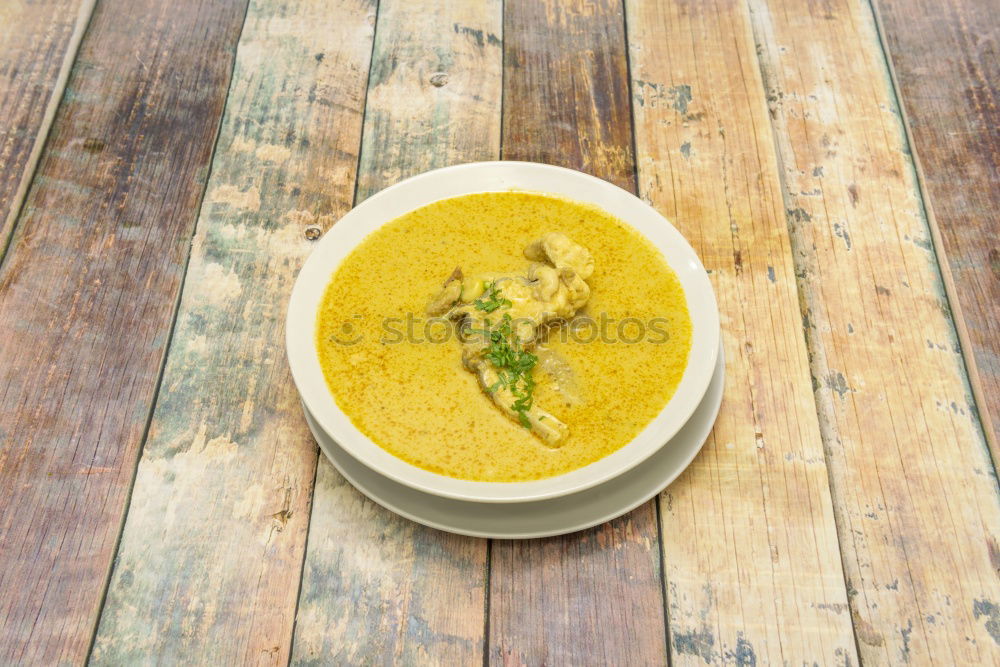 Similar – Image, Stock Photo Pumpkin soup on the plate