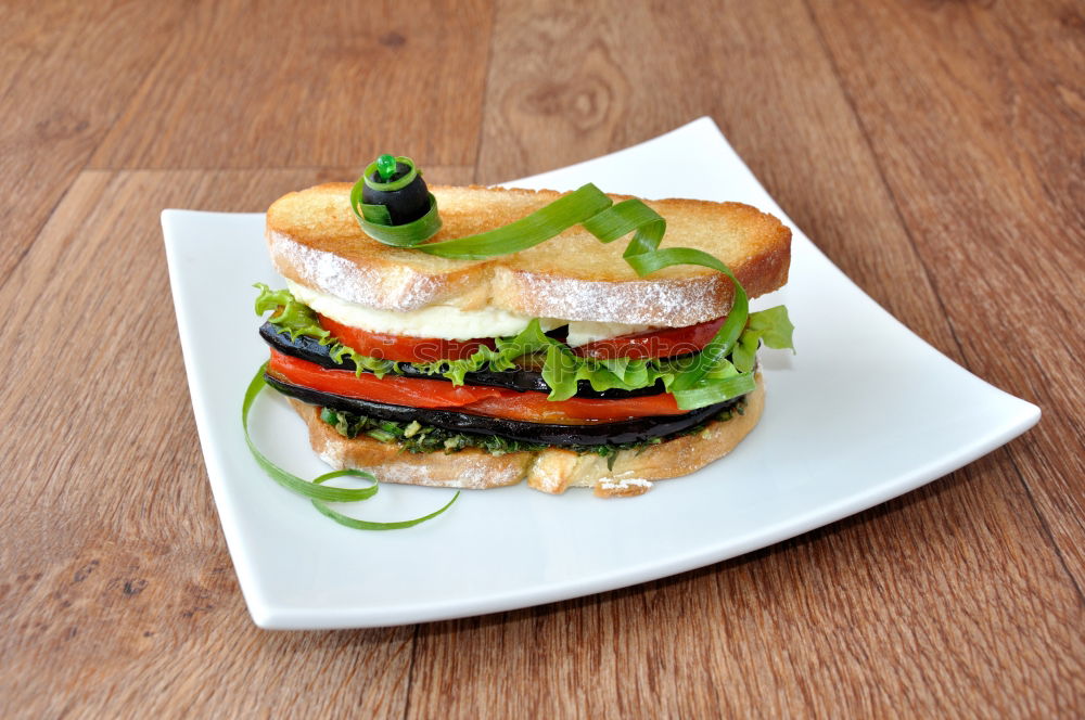 Similar – Image, Stock Photo Mediterranean goat cheese baked in parchment paper