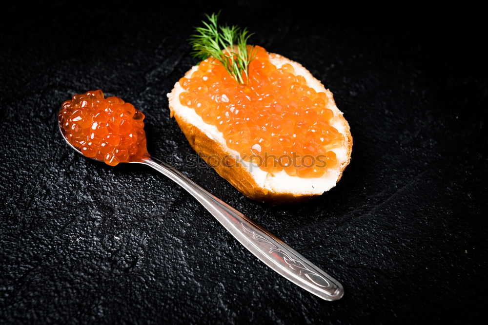 Similar – Oranges on dark background