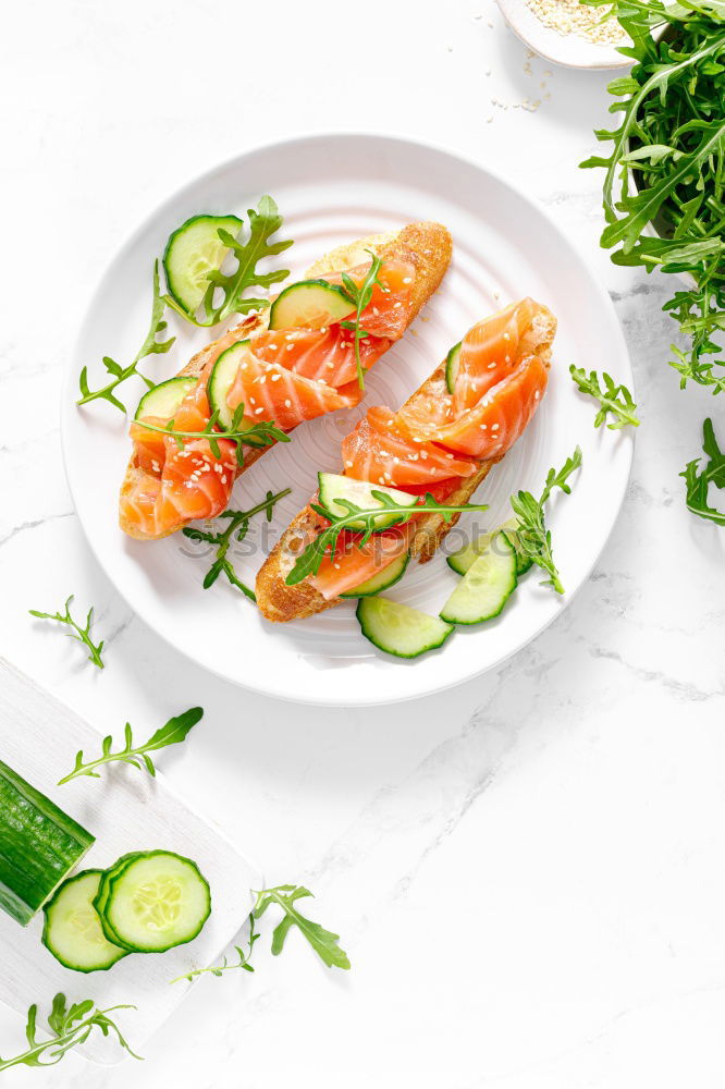 Similar – Fry salmon fillet with dill, lemon, oil and tomatoes