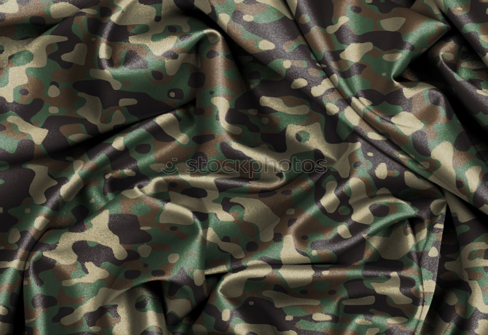 Similar – camouflage Camouflage