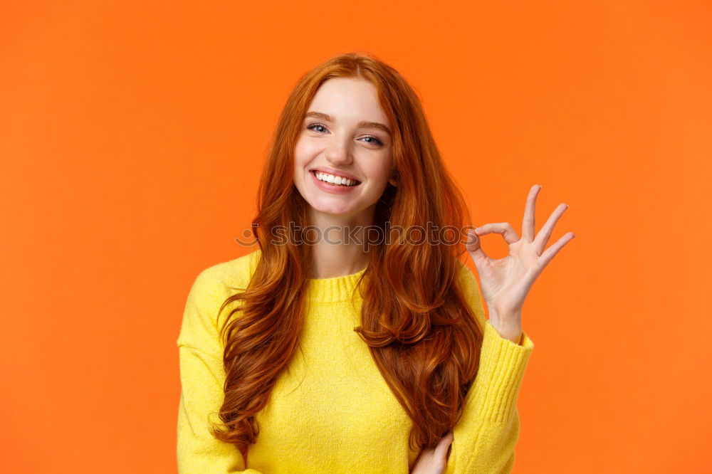 Similar – Image, Stock Photo Portrait of beautiful young woman using mobile phone in the street.