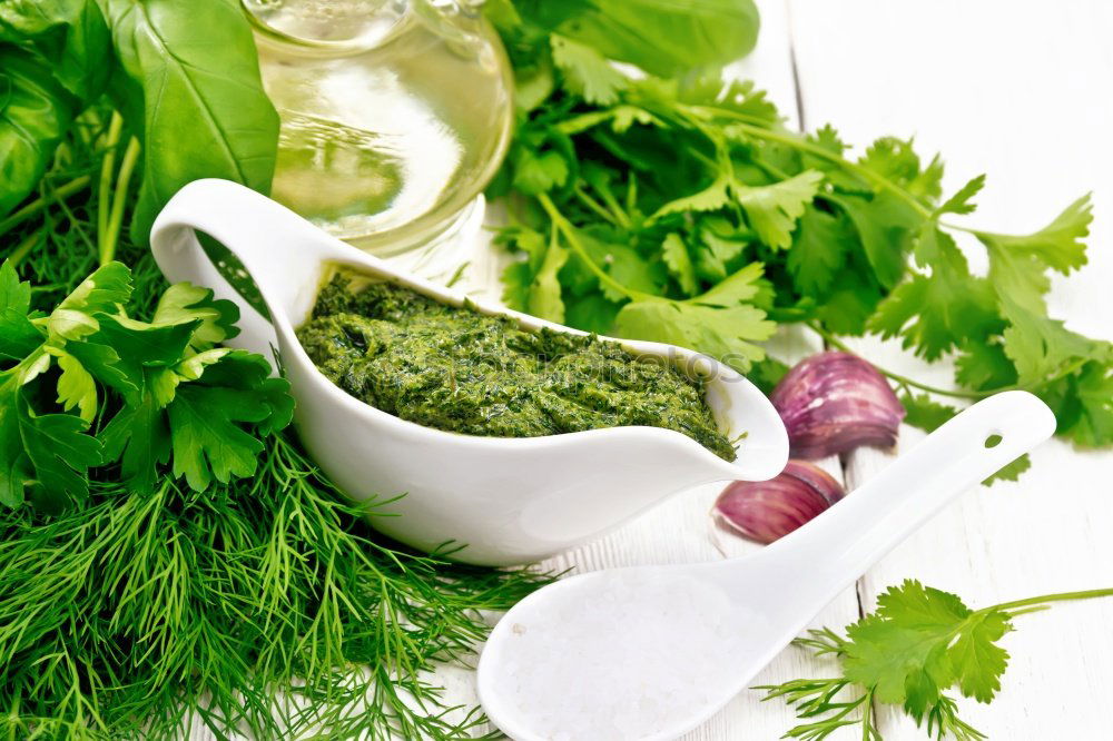 Similar – Image, Stock Photo Green herbs salad with oil in white skin