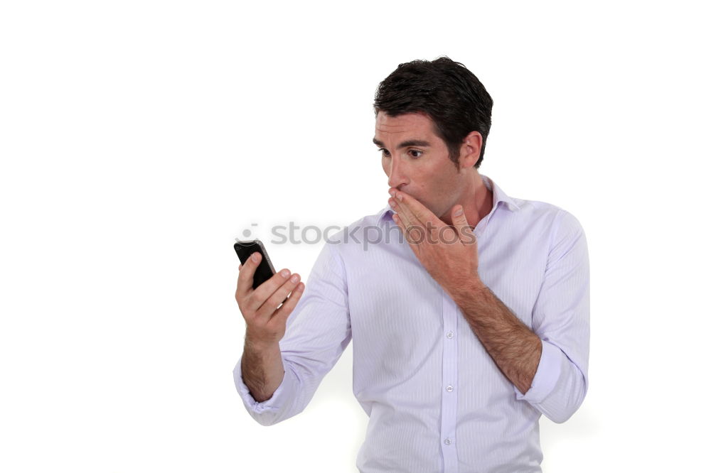 Similar – Business man with mobile phone in his hand