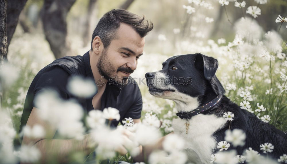 Similar – Cute puppy an his owner at the beach