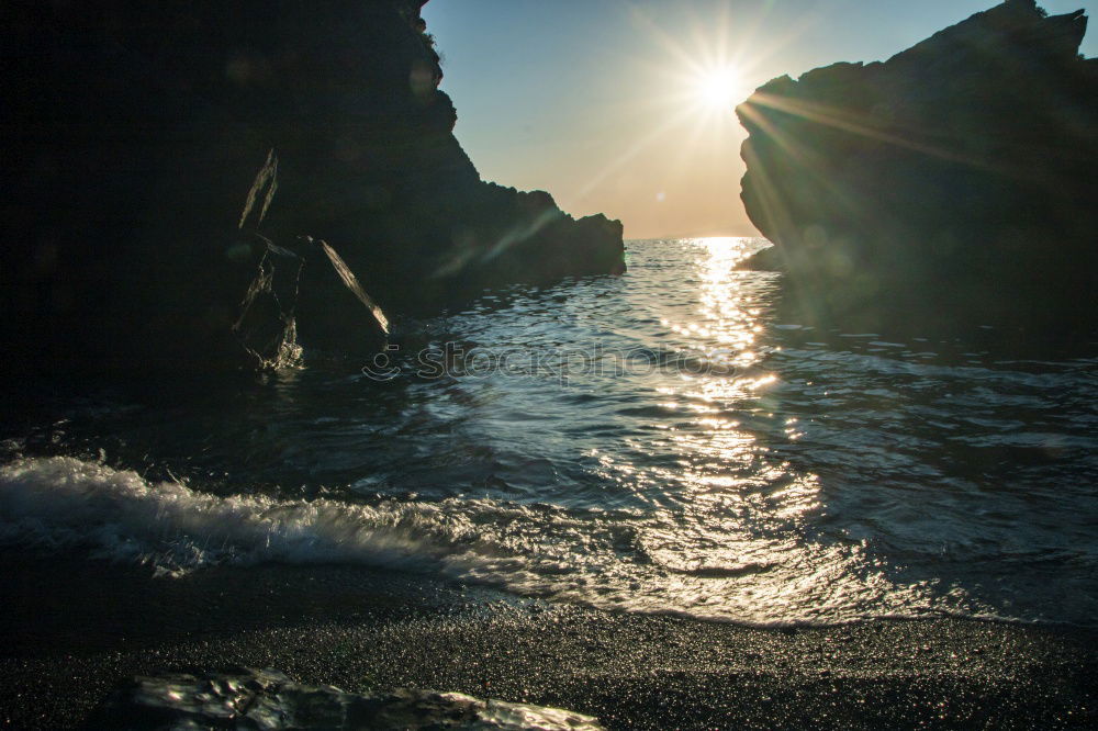 Similar – Image, Stock Photo Liapades Beach, evening atmosphere on a stony beach, waves breaking on a rock behind which the sun is setting