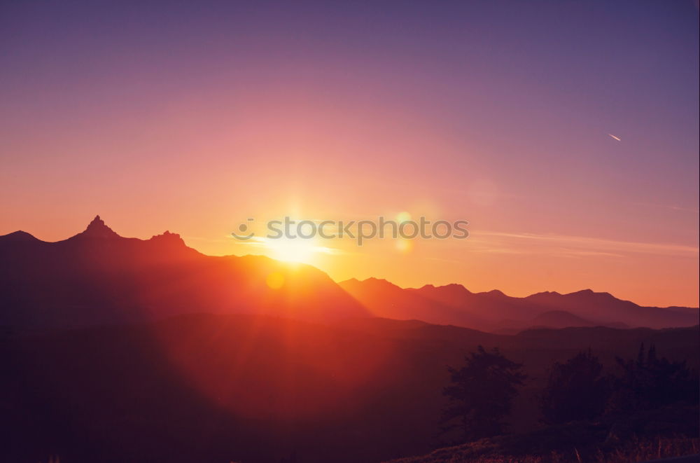 Similar – Panorama mountain landscape at sunset. Valley during sunrise.