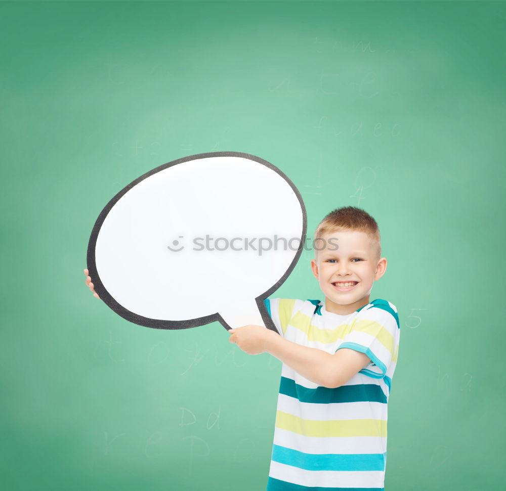 Similar – Image, Stock Photo Boy holding a sign on blue background