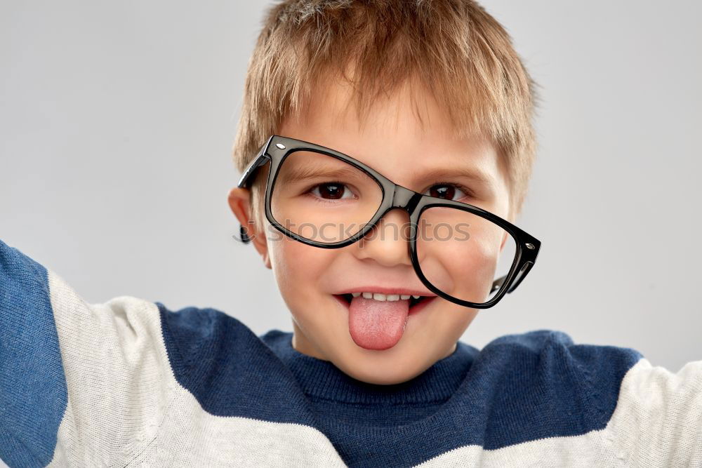 Similar – Happy boy with glasses