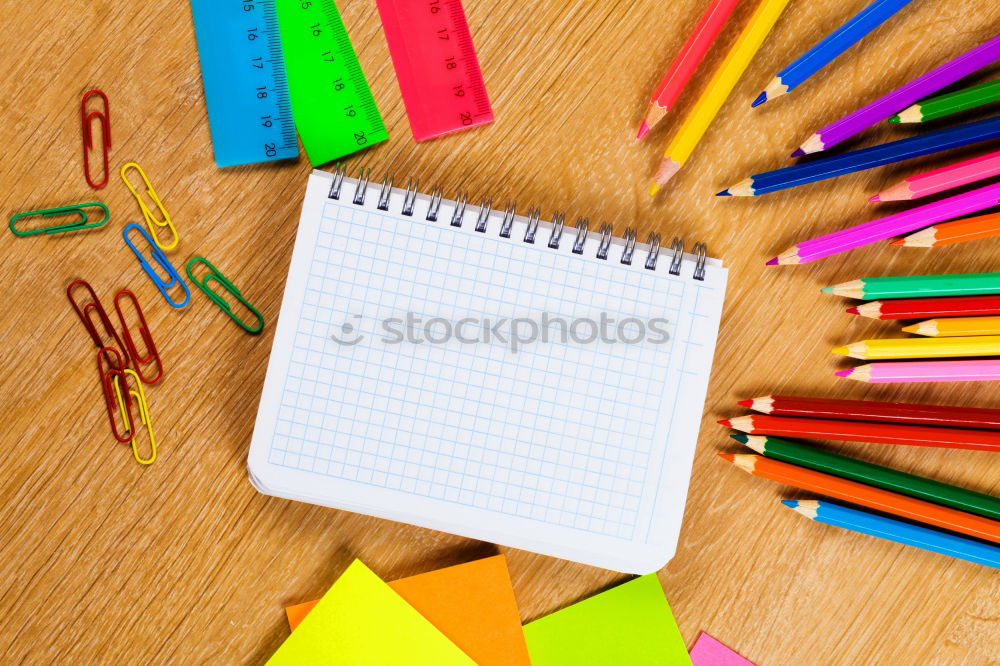 Similar – Minimal work space Colorful background with many crayons,