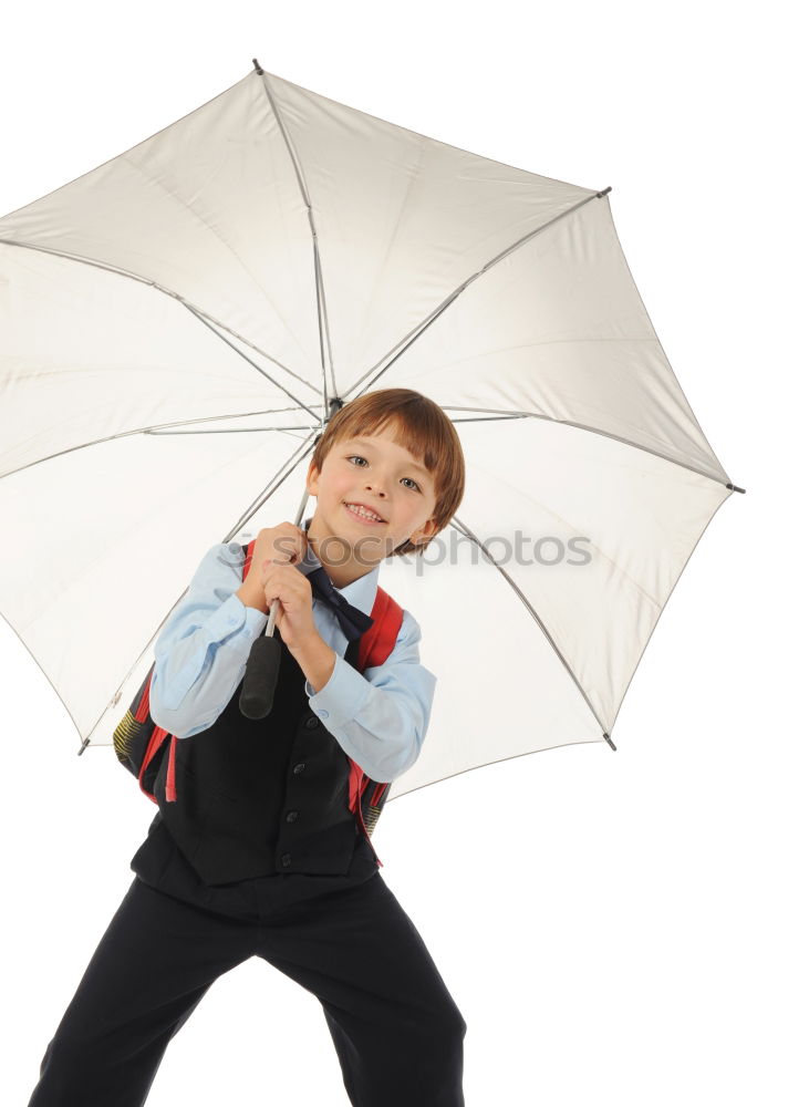 Similar – Little girl standing on rain wearing green raincoat