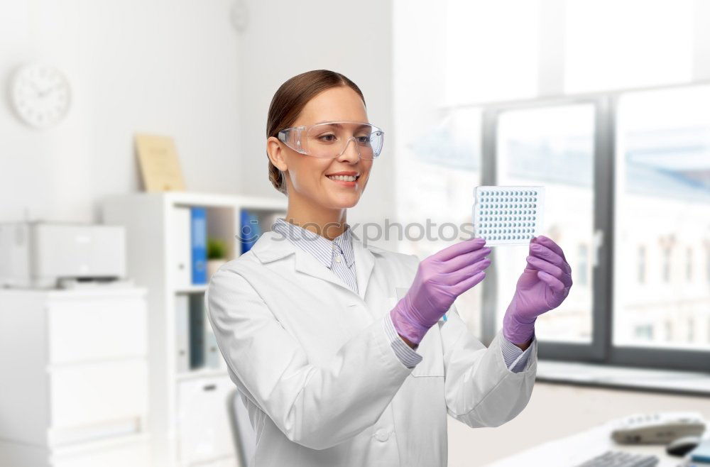 Similar – Image, Stock Photo Woman looking at test tube