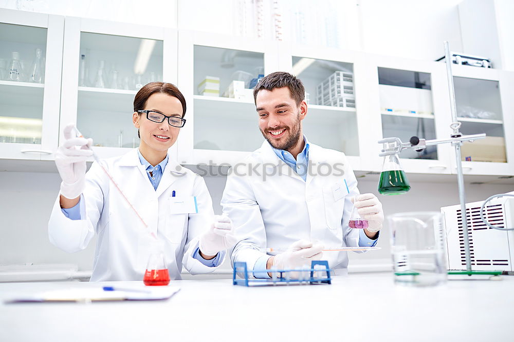 Similar – Image, Stock Photo Women standing and working in lab
