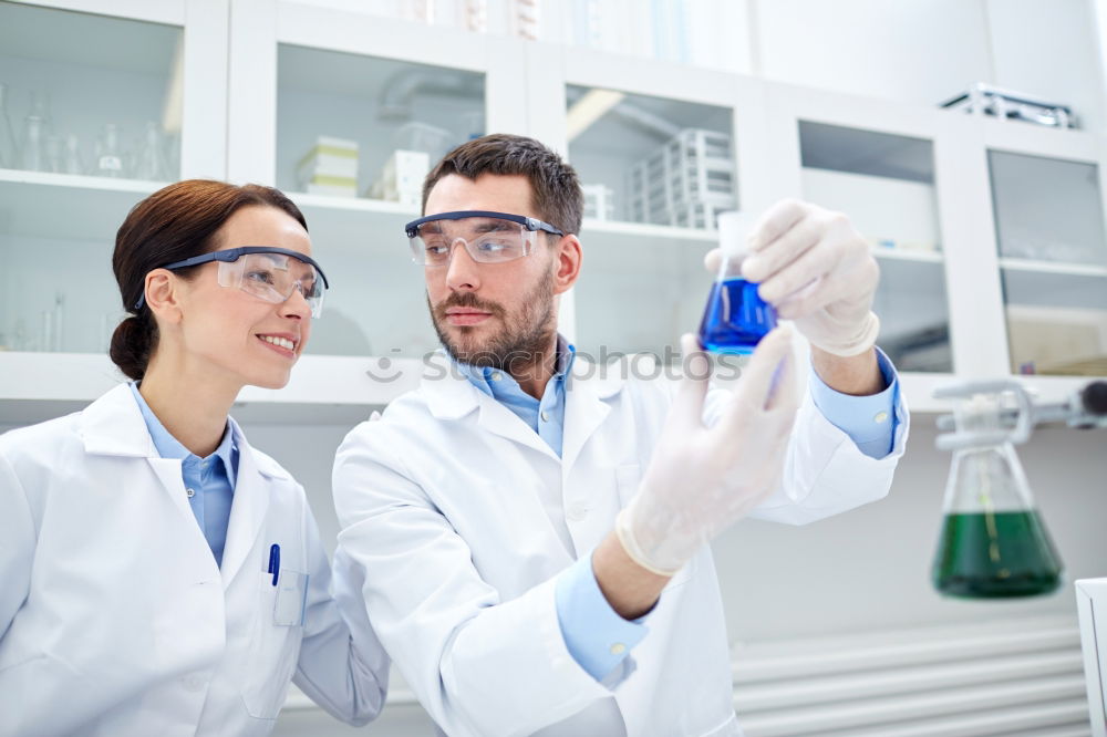 Similar – Image, Stock Photo People working with papers in lab