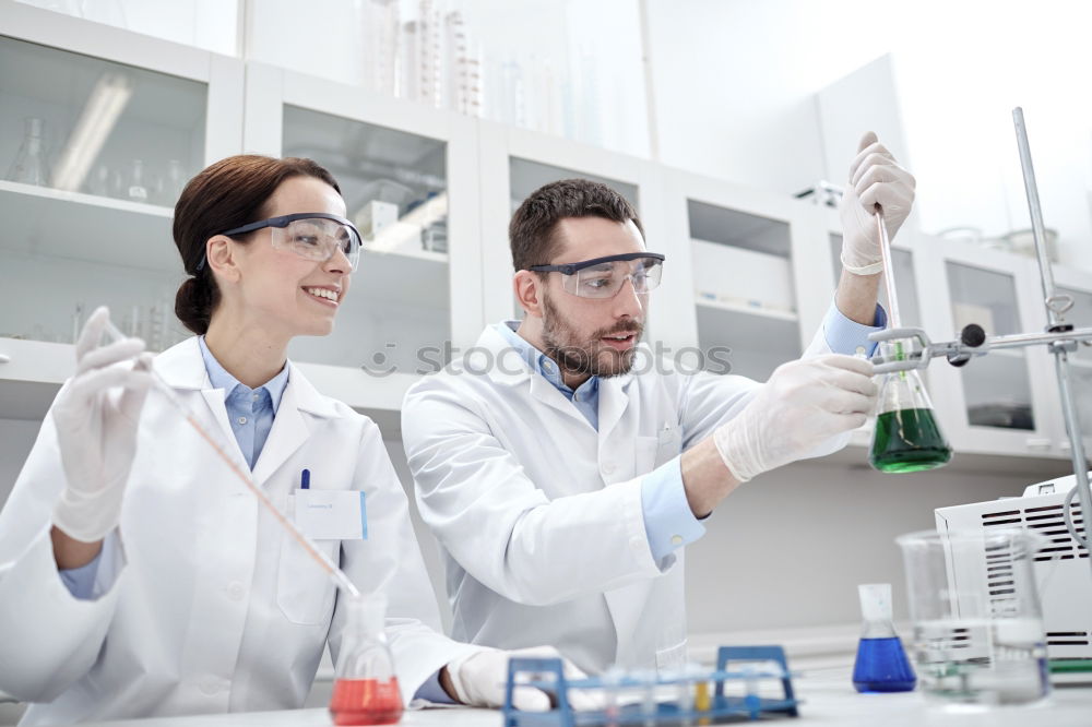 Similar – Image, Stock Photo People working with papers in lab