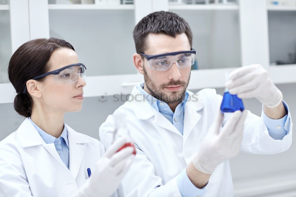 Similar – Image, Stock Photo People working with papers in lab