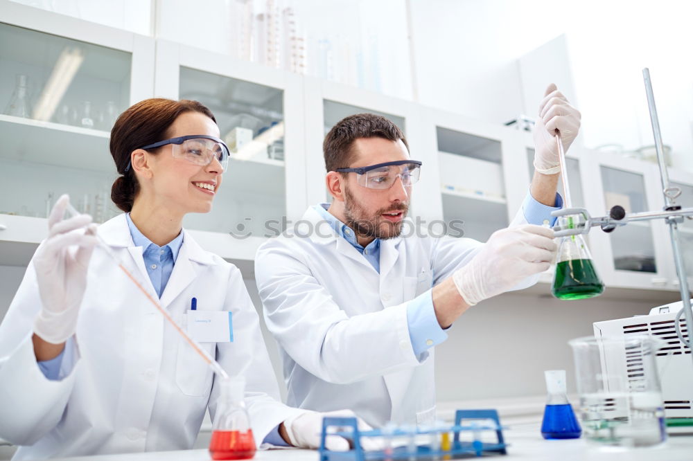 Similar – Image, Stock Photo Woman looking at test tube