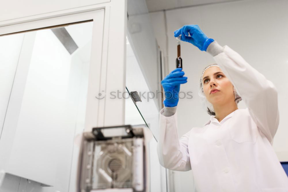 Similar – Image, Stock Photo Women standing and working in lab