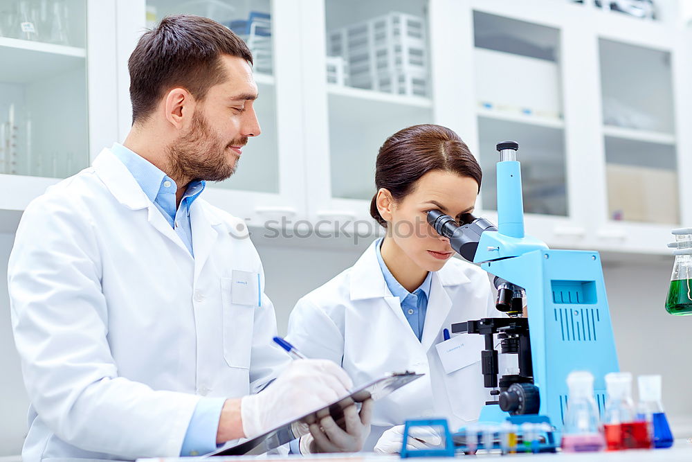 Similar – Image, Stock Photo Women standing and working in lab