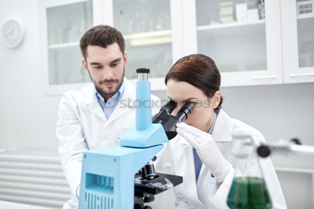 Similar – Image, Stock Photo People working with papers in lab