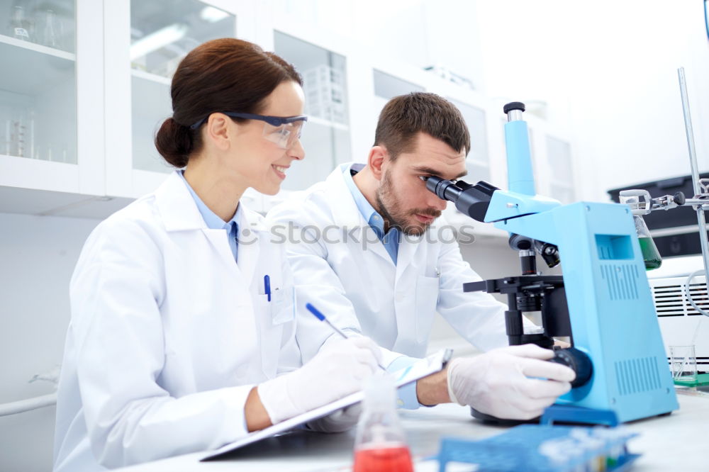 Similar – Image, Stock Photo People working with papers in lab