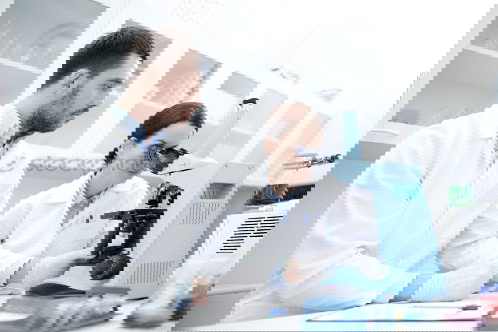 Similar – Image, Stock Photo Woman looking at microscope