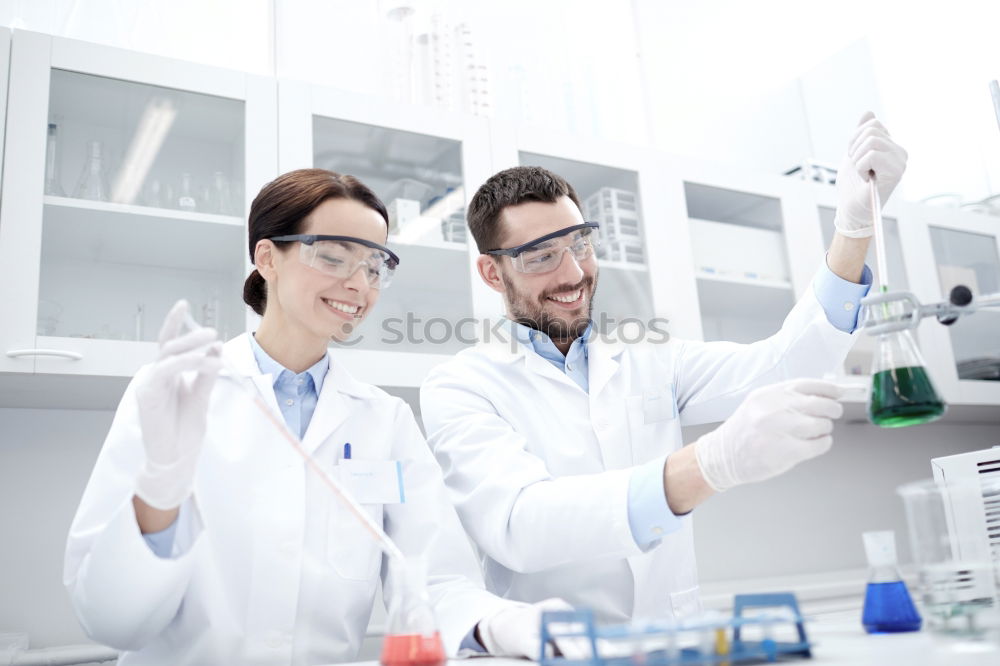 Similar – Image, Stock Photo People working with papers in lab