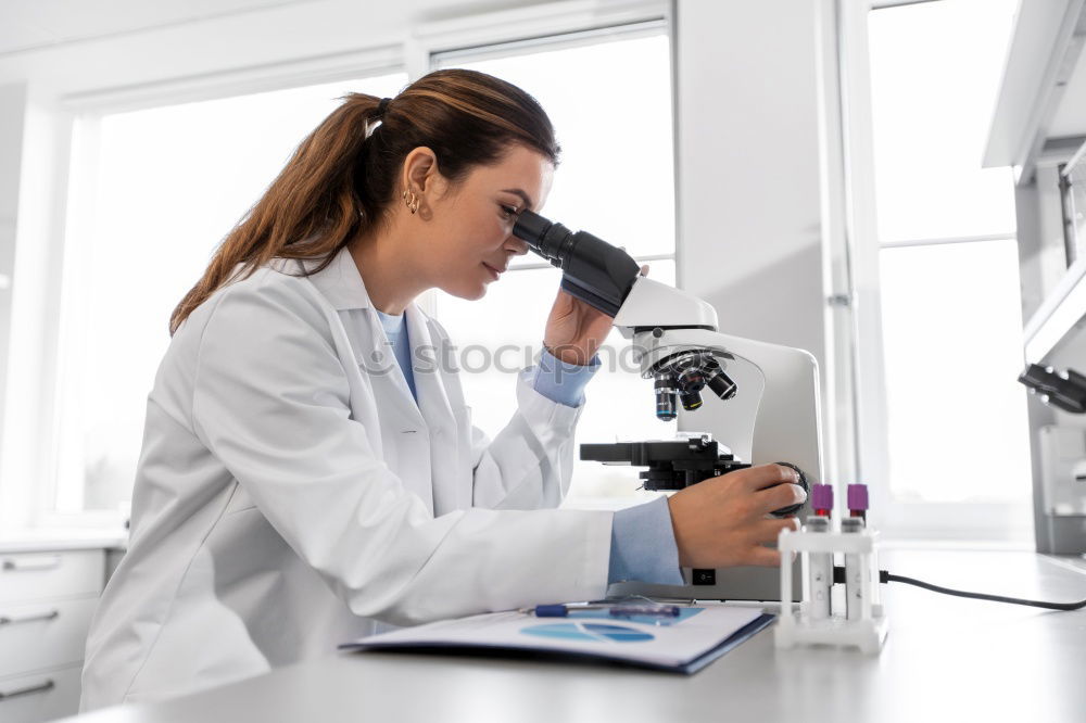 Similar – Image, Stock Photo Woman looking at microscope
