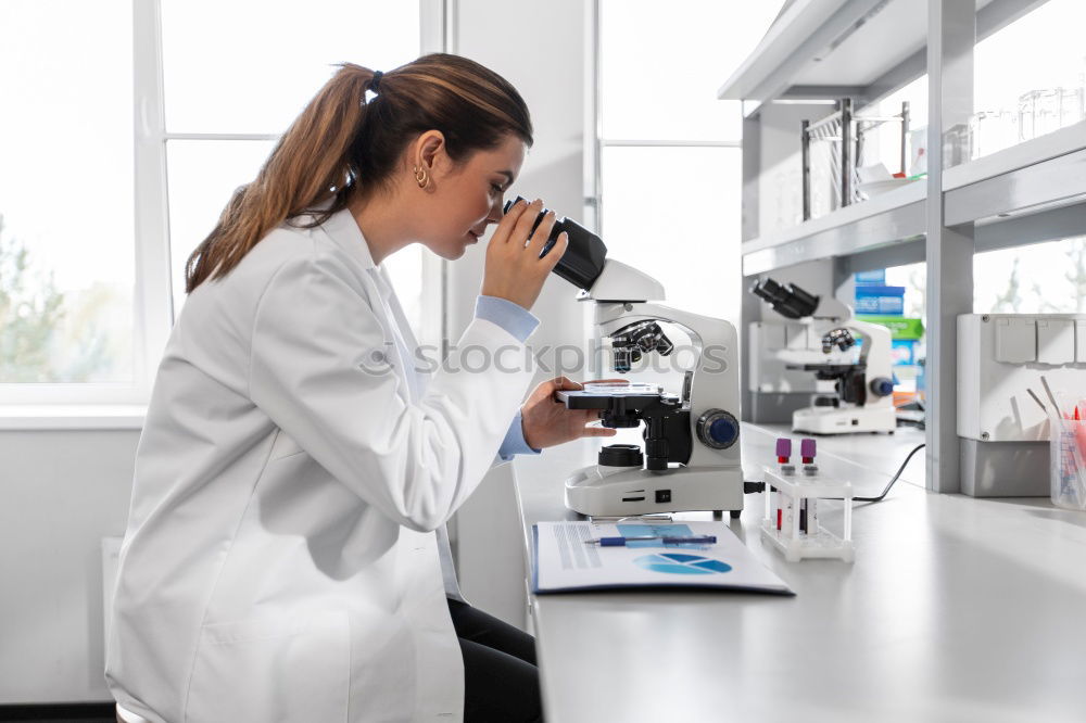 Similar – Image, Stock Photo Woman looking at microscope