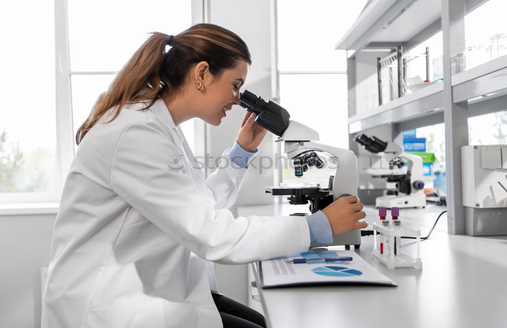 Similar – Image, Stock Photo Worker putting liquid to test tube