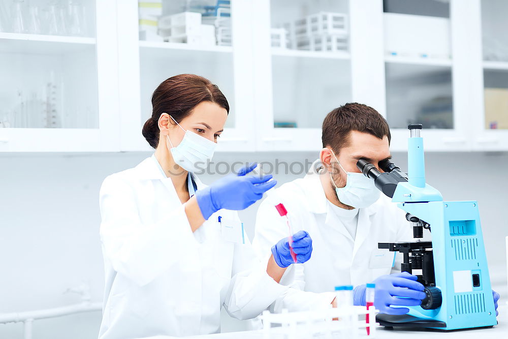 Similar – Image, Stock Photo Worker putting liquid to test tube