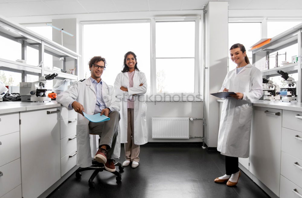 Similar – Image, Stock Photo Woman writing in laboratory