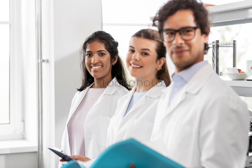 Similar – Image, Stock Photo Workers communicating in lab