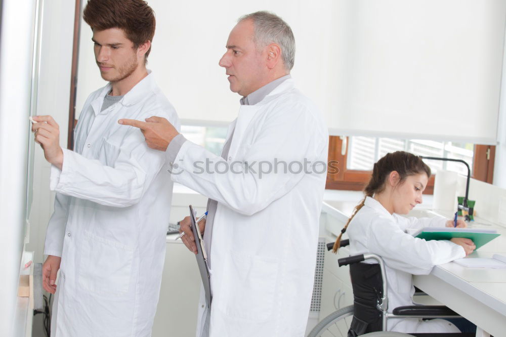 Similar – Image, Stock Photo People co-working in lab