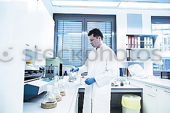 Similar – Image, Stock Photo Biologist woman working in the laboratory