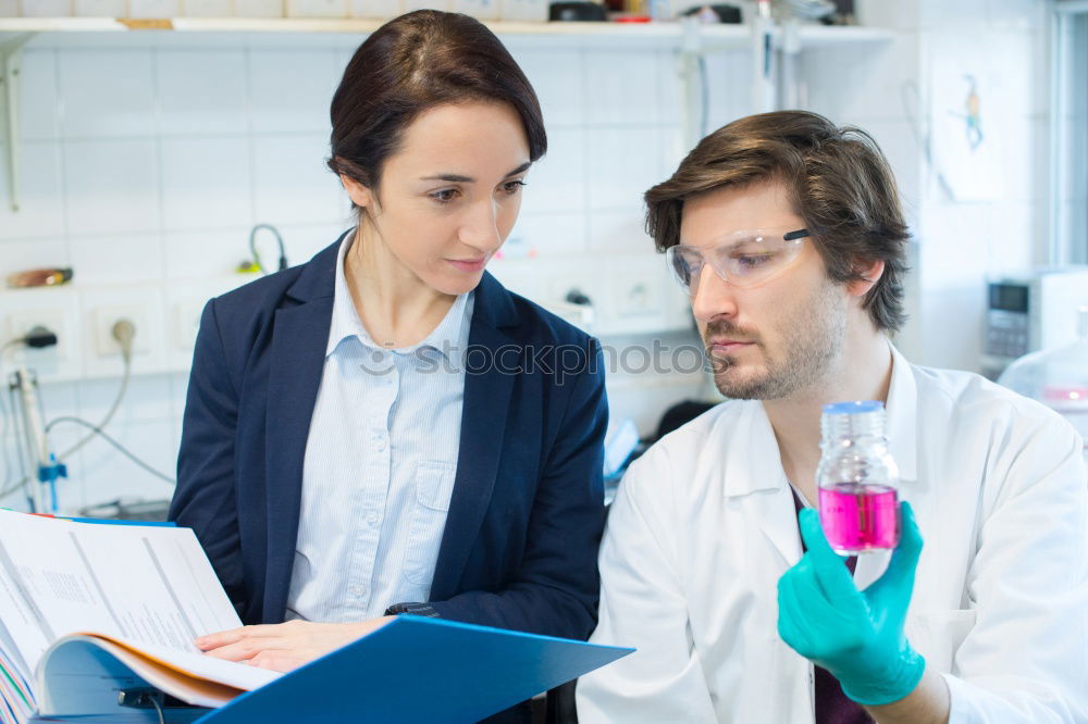 Similar – Image, Stock Photo People working with papers in lab