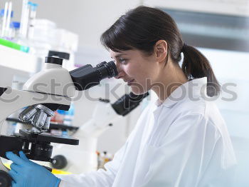 Similar – Image, Stock Photo Woman looking at microscope