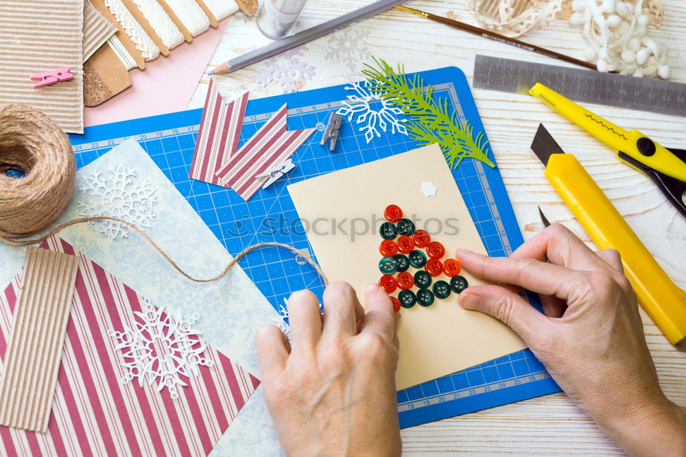 Similar – Image, Stock Photo Girl making Christmas tree decoration from paper