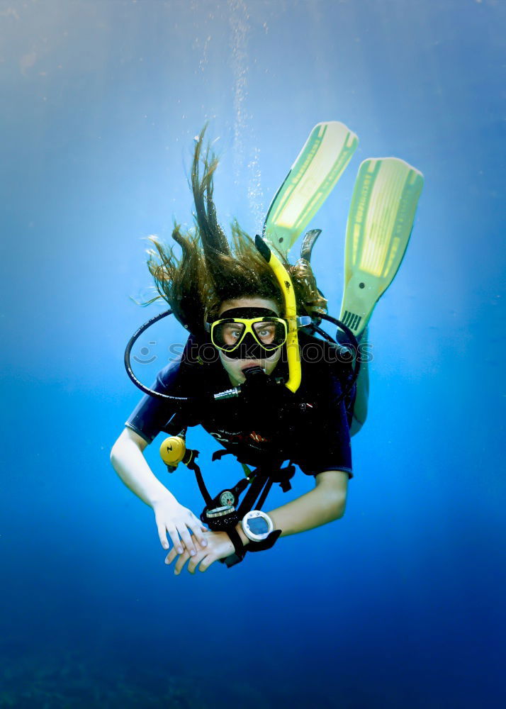 Similar – Diver with Bubbles II