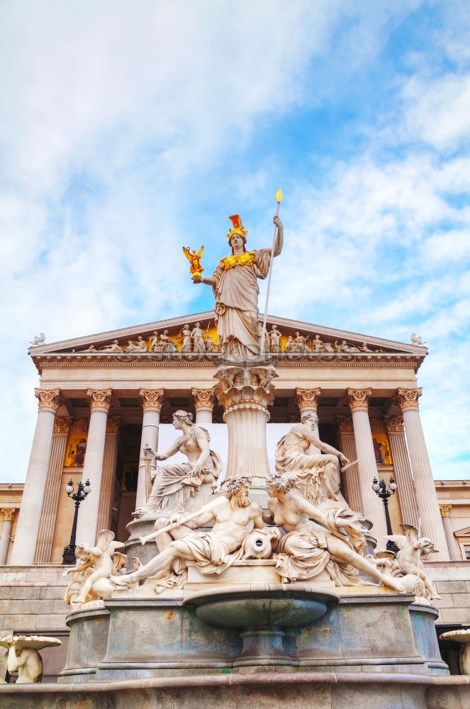 The parliament in Vienna, in front of it the Pallas Athene fountain.